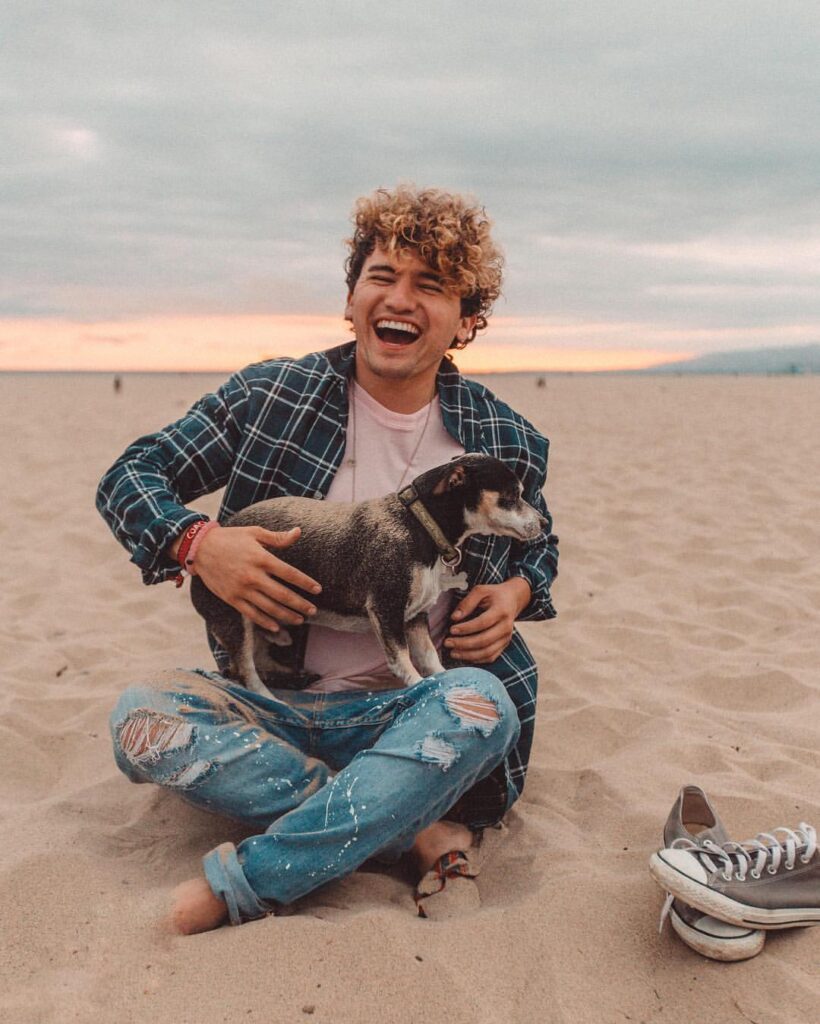 JC Caylen with his childhood dog, Wishbone.