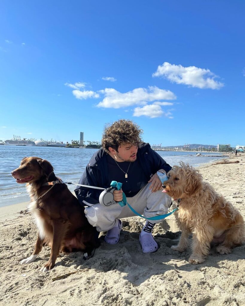 JC Caylen with his dogs Barrie and Bambi.